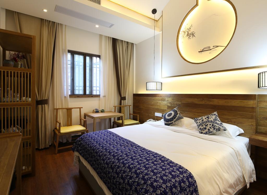 Floral Hotel - Yuexiang Inn Wuzhen Цзясін Екстер'єр фото