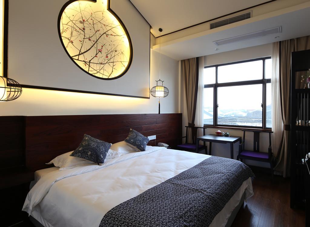 Floral Hotel - Yuexiang Inn Wuzhen Цзясін Екстер'єр фото