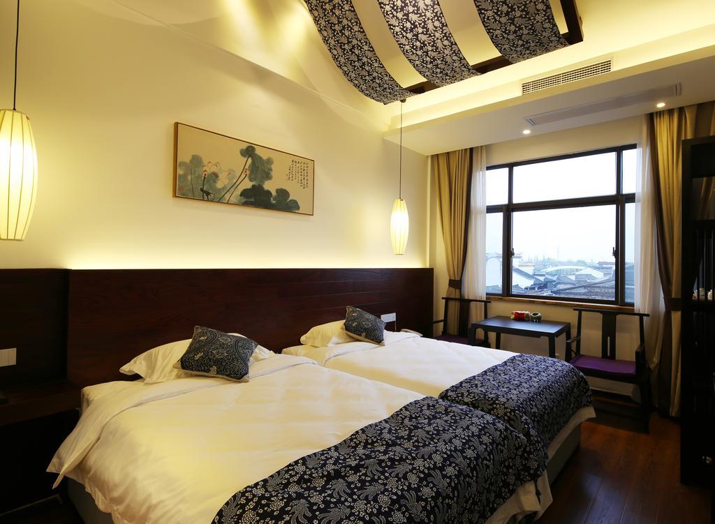 Floral Hotel - Yuexiang Inn Wuzhen Цзясін Екстер'єр фото