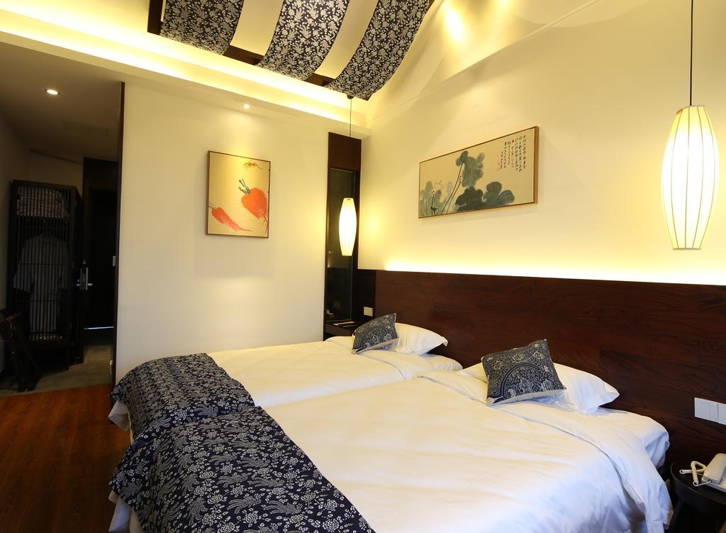 Floral Hotel - Yuexiang Inn Wuzhen Цзясін Екстер'єр фото