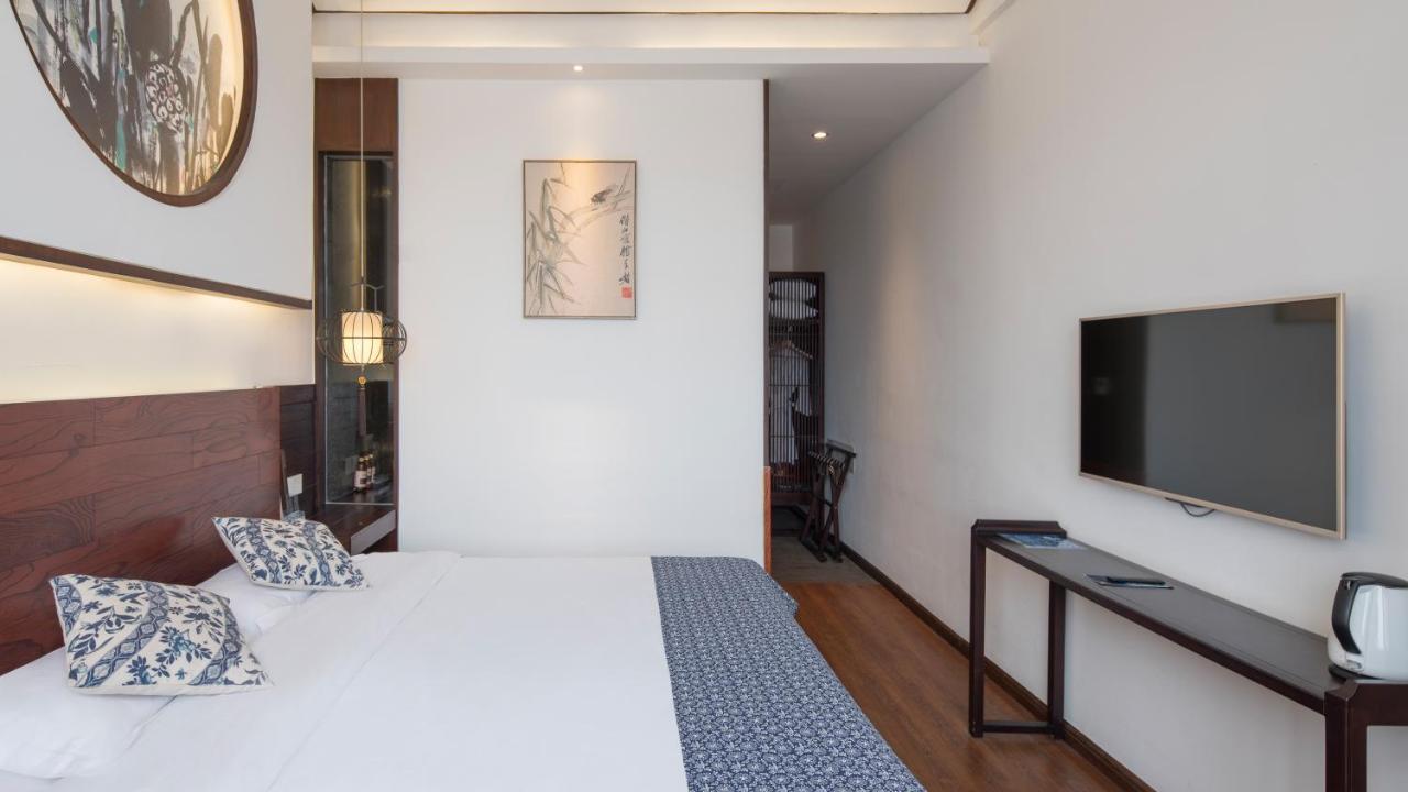 Floral Hotel - Yuexiang Inn Wuzhen Цзясін Екстер'єр фото